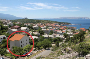 Apartments with a parking space Senj - 5562